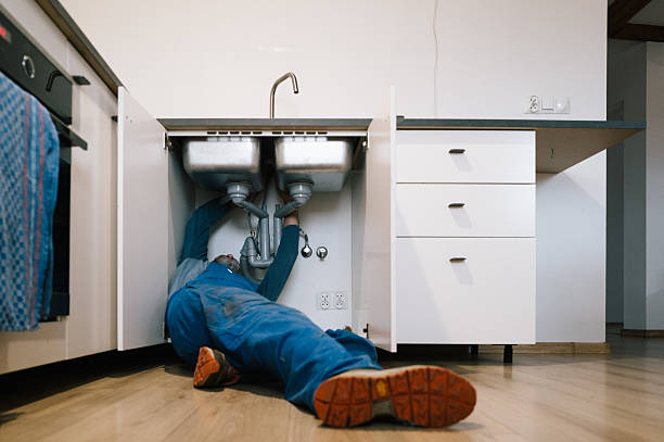 Professional Emergency Plumber technician working in Moosup, CT